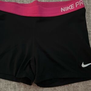 Nike Black and Pink Athletic Shorts with Compression Fit